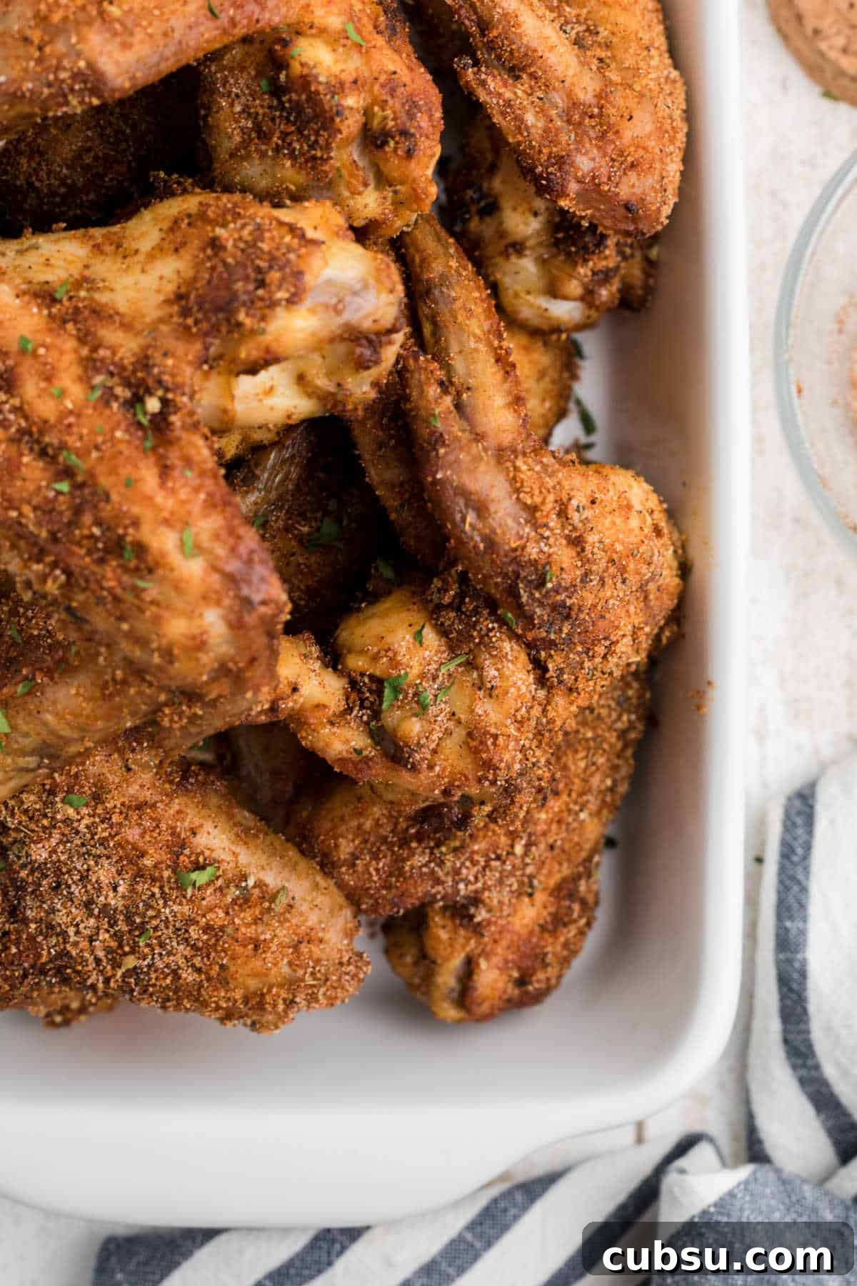 Close up overhead shot of chicken wings cooked with copycat Wingstop Louisiana Rub Recipe.