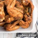 Wingstop Louisiana Rub Recipe on some wings cooked and in a dish.