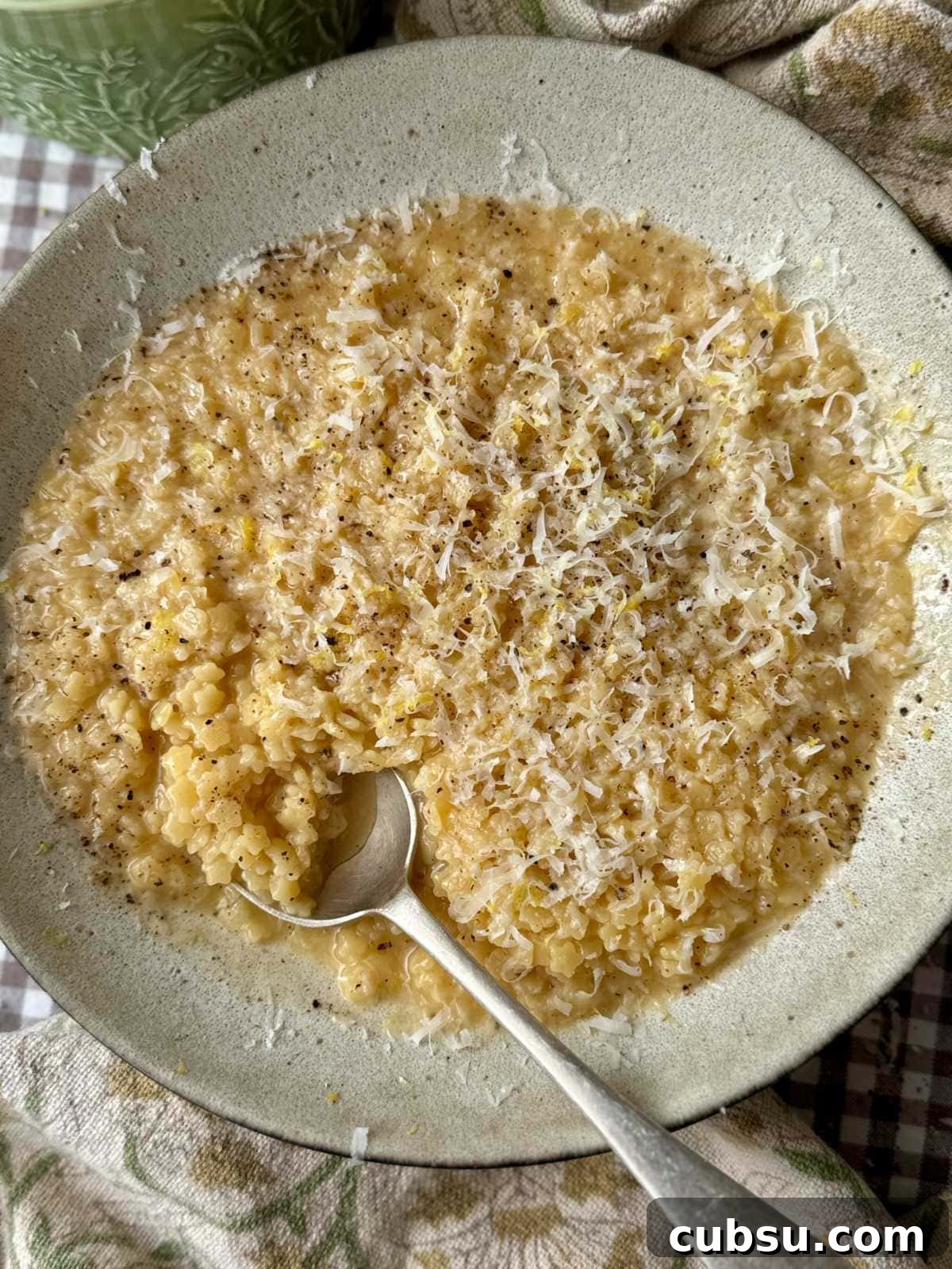 Creamy Pastina Recipe: Quick Comfort Pasta in 20 Minutes 2 a bowl of creamy pastina with a spoon in the bowl.
