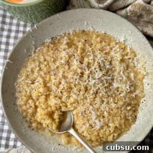 Creamy Pastina Recipe: Quick Comfort Pasta in 20 Minutes 8 a bowl of creamy pastina with a spoon in the bowl.