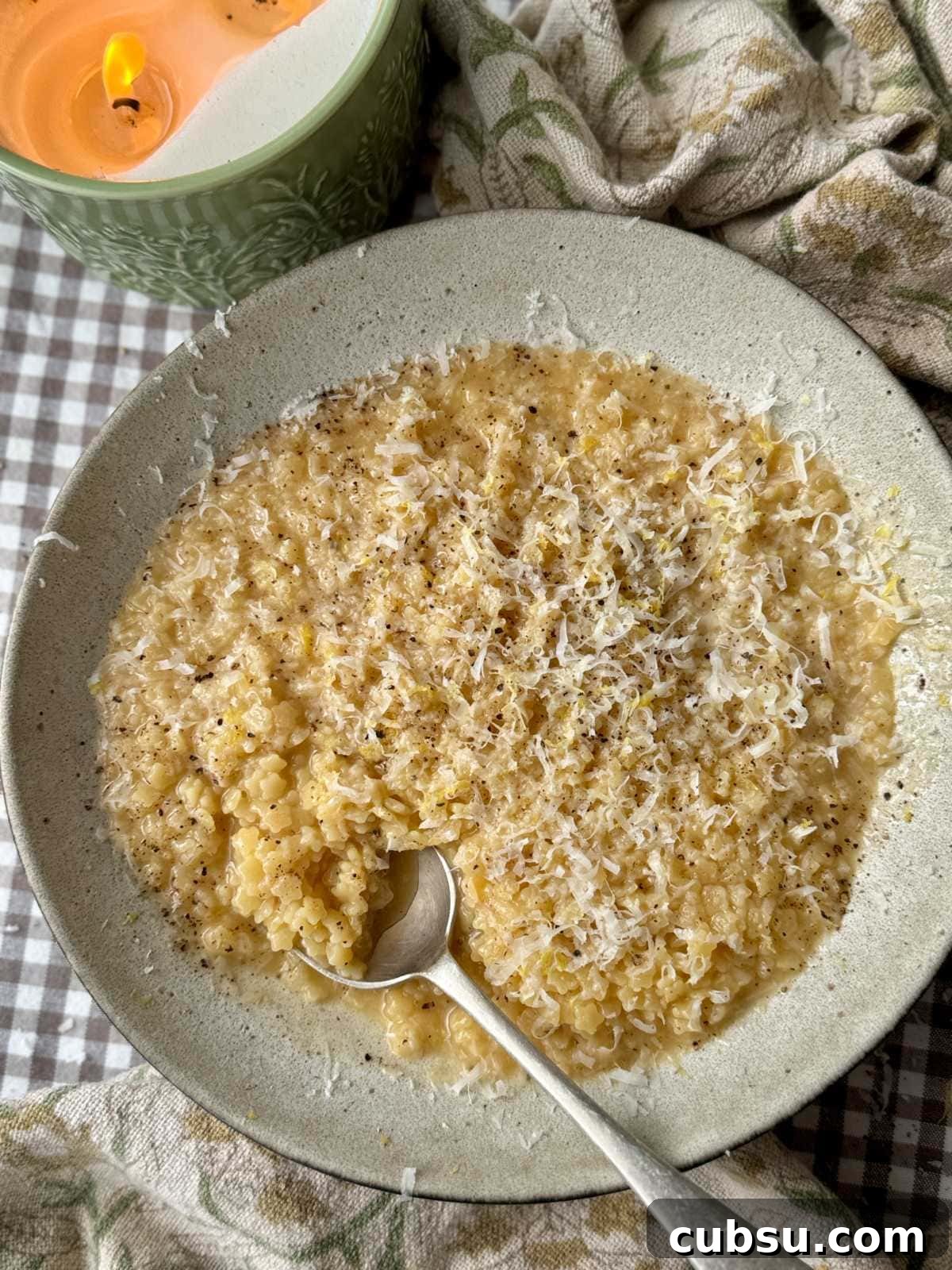 Creamy Pastina Recipe: Quick Comfort Pasta in 20 Minutes 3 a bowl of creamy pastina with a spoon in the bowl.