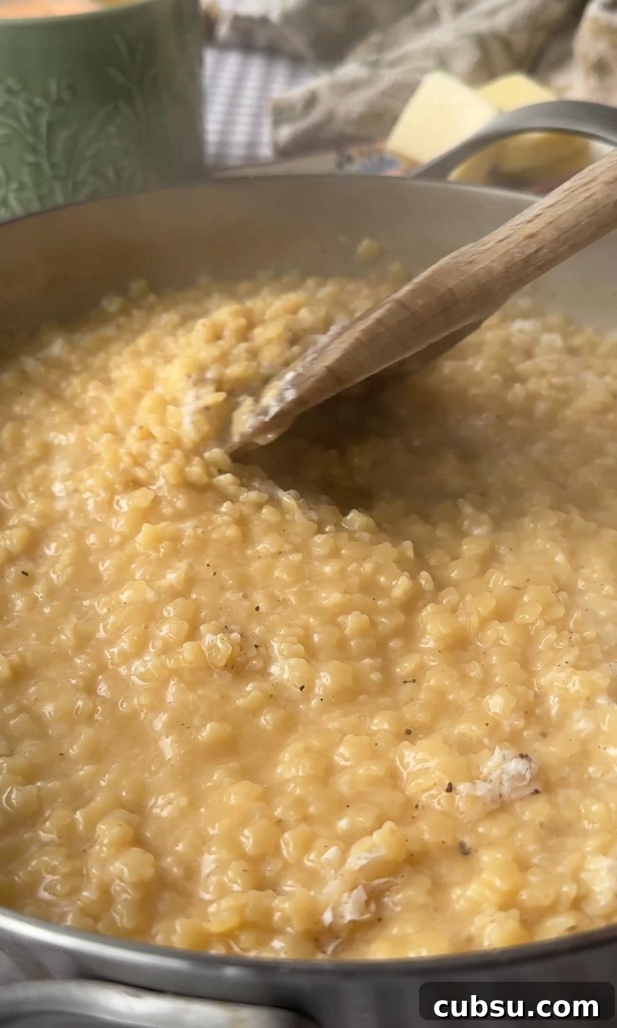 Creamy Pastina Recipe: Quick Comfort Pasta in 20 Minutes 7 stirring pastina.