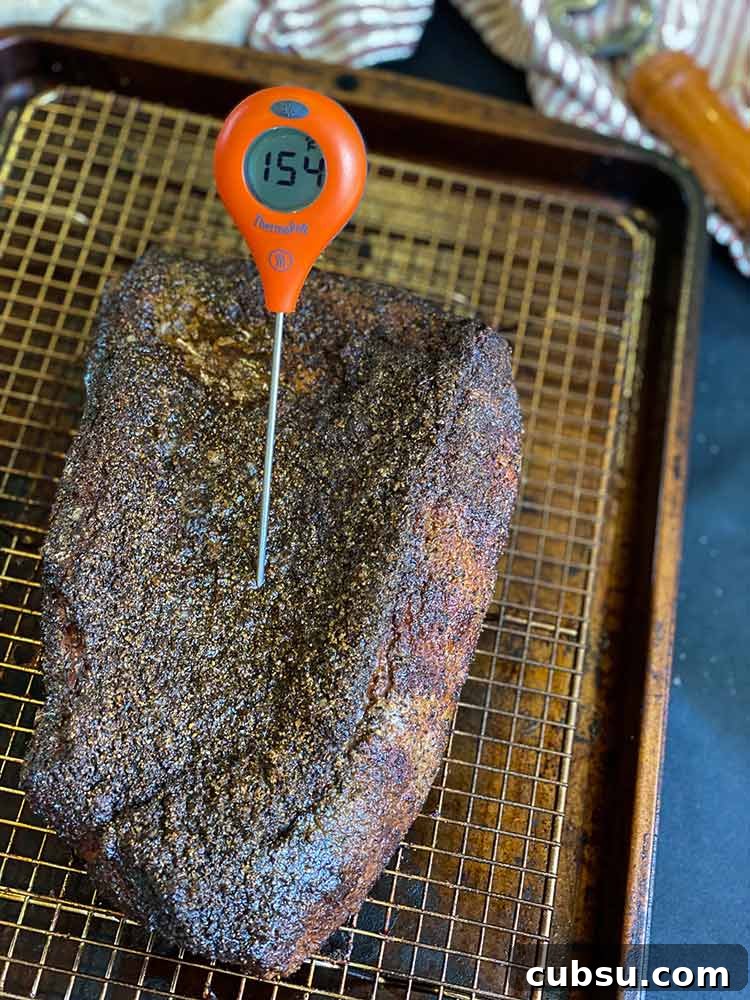 Smoked and Beer-Braised Corned Beef Recipe for Tender, Flavorful Meat 9 check temperature with a quick-read thermometer