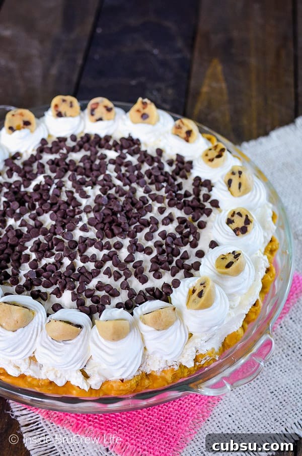 Cookie Dough Cheesecake Brownie Pie Cookie Dough Cheesecake Brownie Pie - little cookie dough bites inside a creamy cheesecake turn this brownie pie into an amazing dessert.