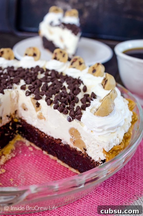 Cookie Dough Cheesecake Brownie Pie Cookie Dough Cheesecake Brownie Pie - a fudgy brownie pie topped with a fluffy cookie dough cheesecake is a delicious dessert.