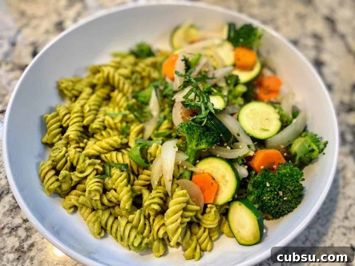 Vegan Pesto Pasta Recipe Vegan pesto pasta recipe in a bowl on the counter.