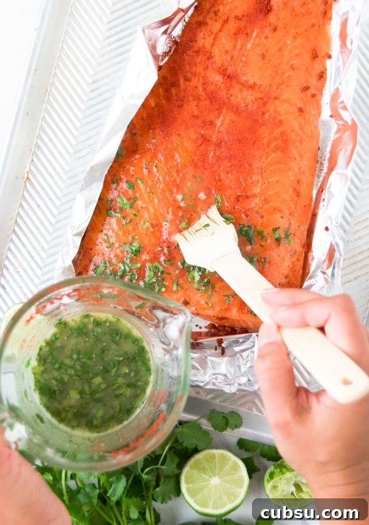 Citrus-Baked Salmon with Lime and Herbs 5 Basting lime salmon with honey-butter and cilantro