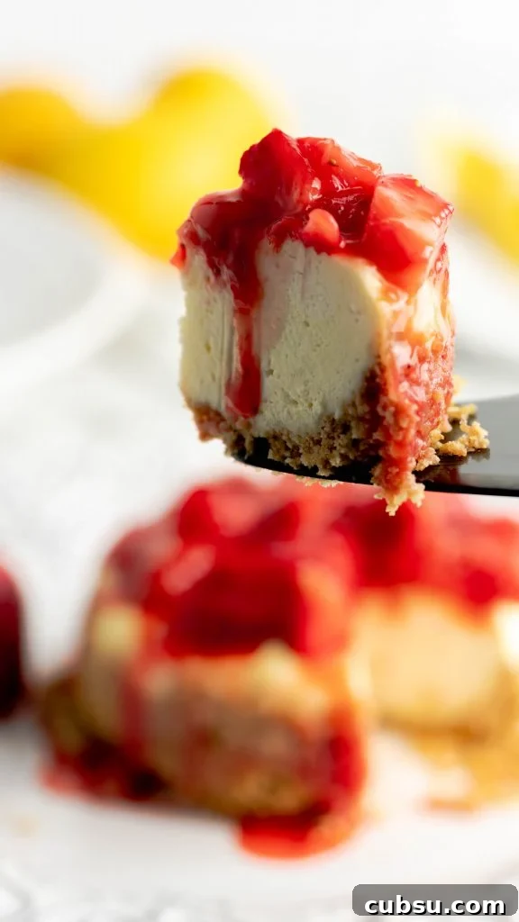 Instant Pot Strawberry Cheesecake Recipe — Creamy One-Pot Dessert 2 Strawberry cheesecake with a graham cracker crust and strawberry compote.