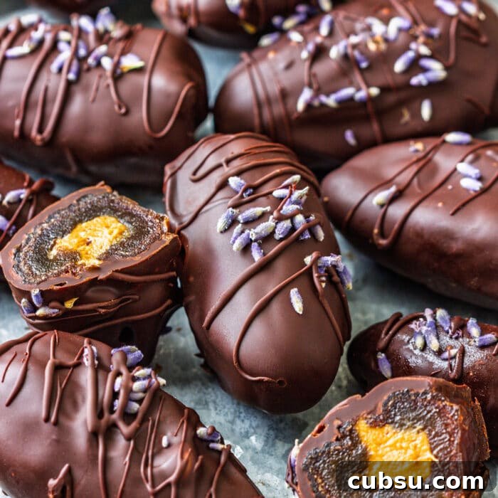 Quick After-School Snack Ideas Kids Will Love 5 Close-up of chocolate-covered dates filled with peanut butter, showing a chewy and rich texture.