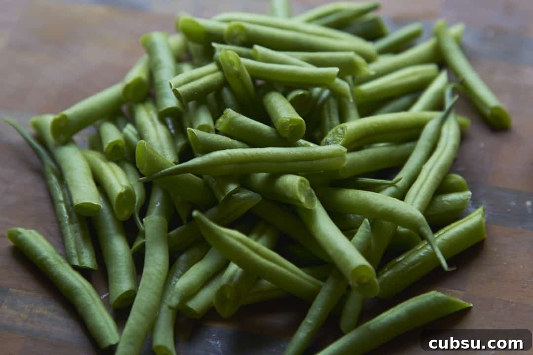 Mediterranean Green Bean Salad with Tomatoes, Feta & Mint 4 Sliced green beans ready for a green bean salad recipe.