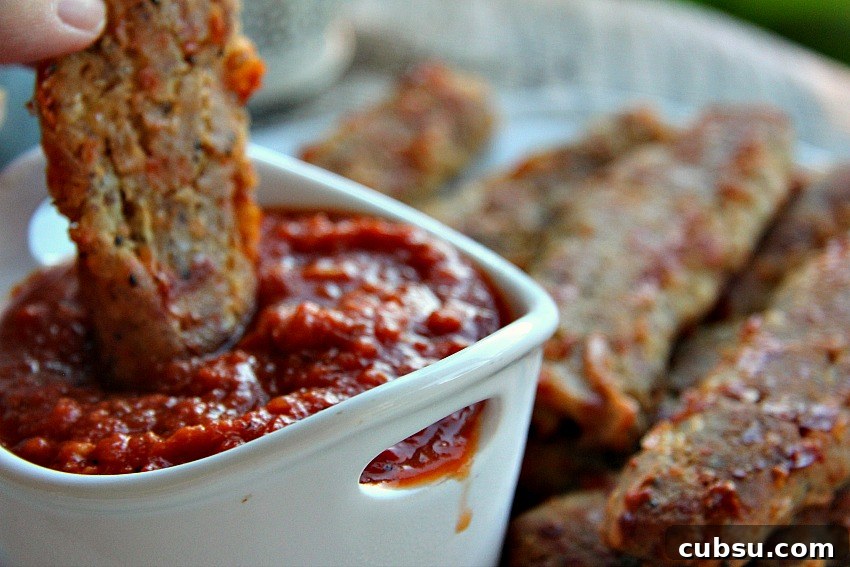 Low-Carb Keto Cheesy Garlic Breadsticks for Quick Snacks 3 breadsticks-dip