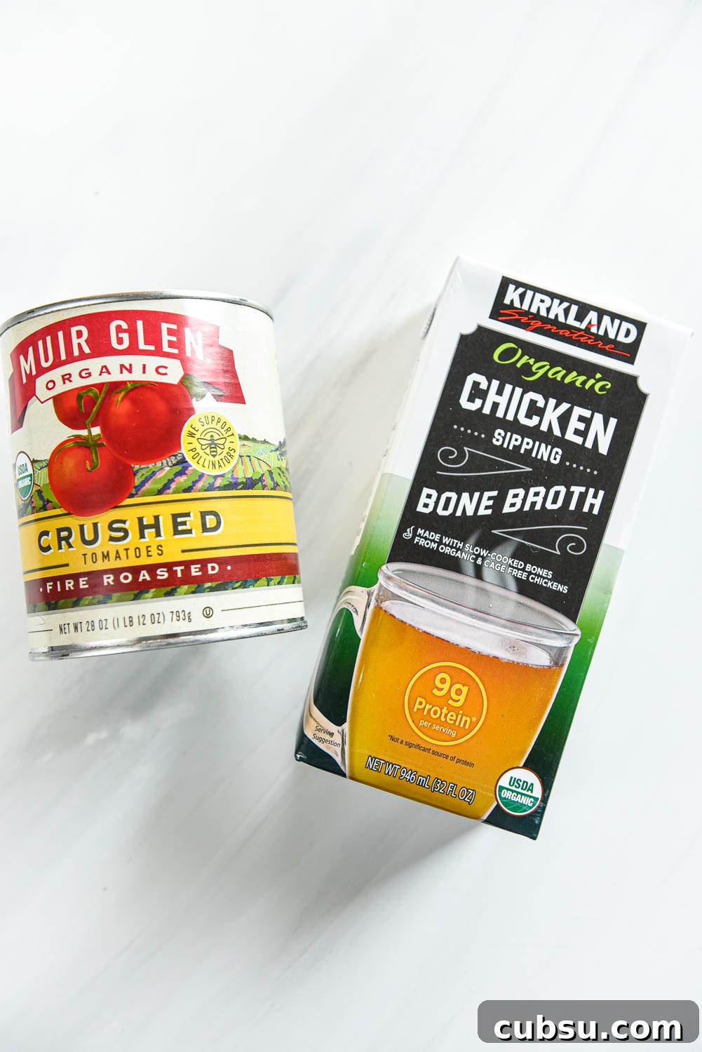 can of crushed tomatoes and box of chicken bone broth