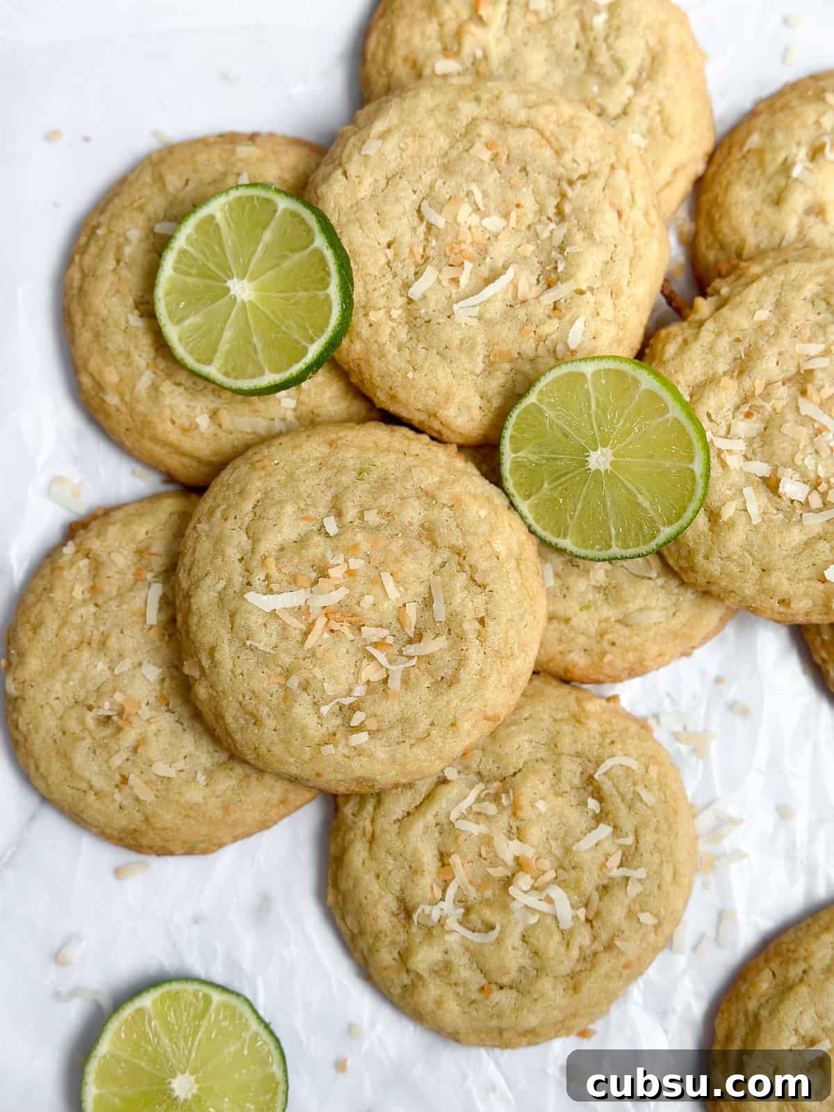 Zesty Lime Coconut Cookies Recipe for Fresh Tropical Flavor 2 Lime Coconut Cookies all stacked together.