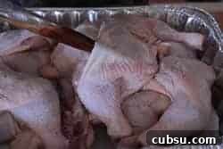 Smoked Chicken Quarters with Beer BBQ Glaze 4 Injecting rub/butter under the skin