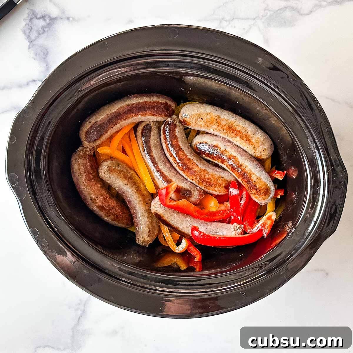 Sausage and peppers in a crock pot.