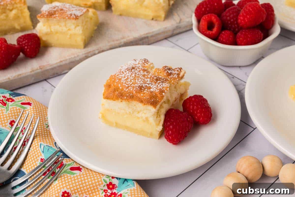 Make-Ahead Magic Cake Recipe: Fluffy Three-Ingredient Sponge 2 Magic Cake cut into squares.