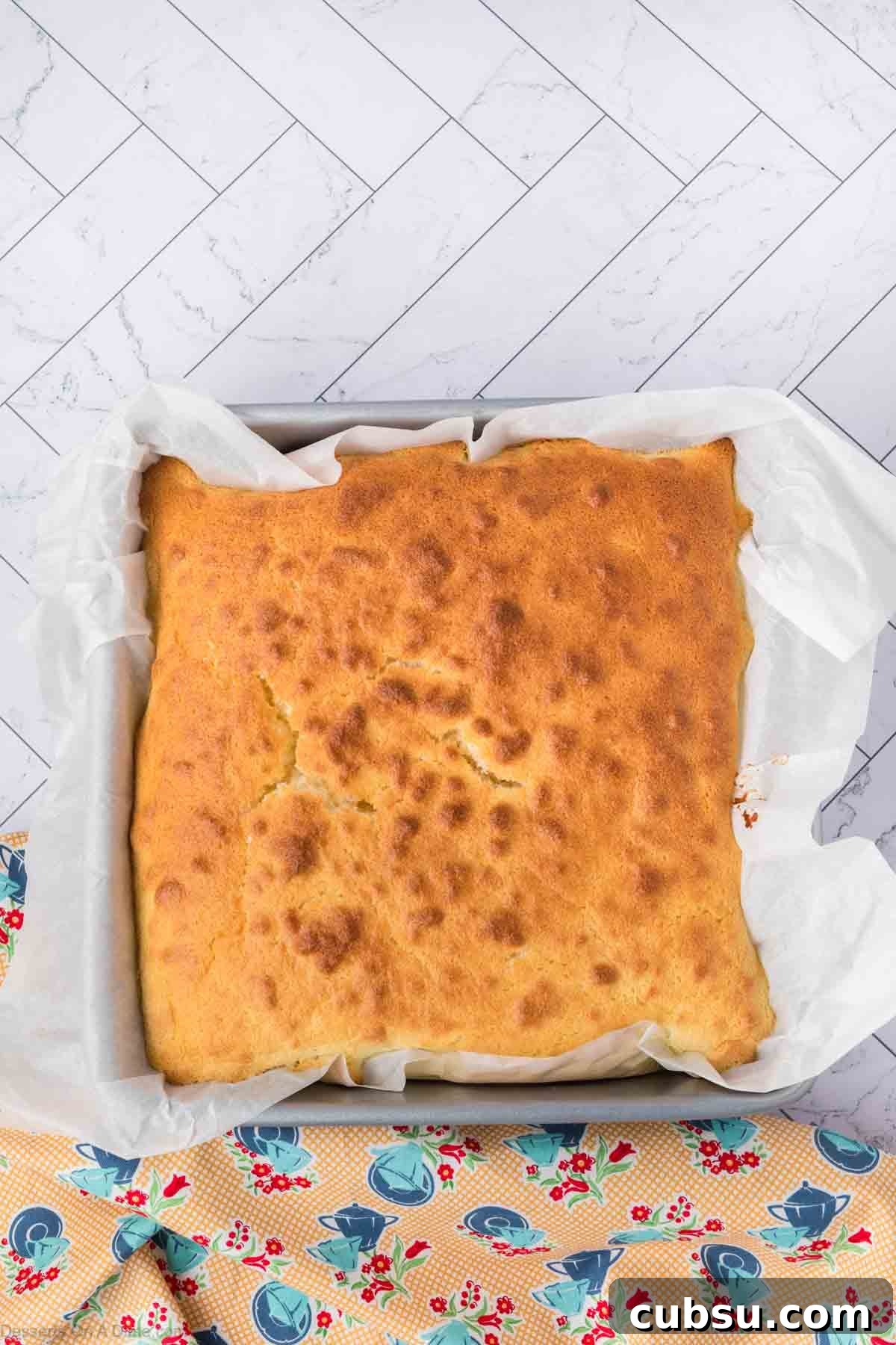 Make-Ahead Magic Cake Recipe: Fluffy Three-Ingredient Sponge 11 Cake cooling in pan.