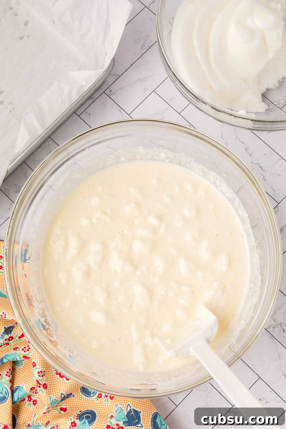 Make-Ahead Magic Cake Recipe: Fluffy Three-Ingredient Sponge 8 Whipped egg whites folded into batter.