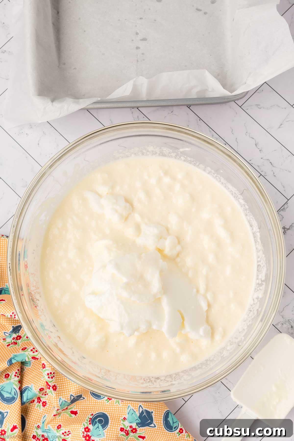 Make-Ahead Magic Cake Recipe: Fluffy Three-Ingredient Sponge 9 Batted combined in mixing bowl.