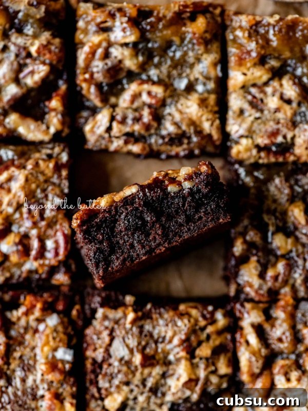 7-Layer Magic Cookie Bars Recipe: Simple Crowd-Pleaser 10 Salted pecan pie brownies placed on brown parchment paper