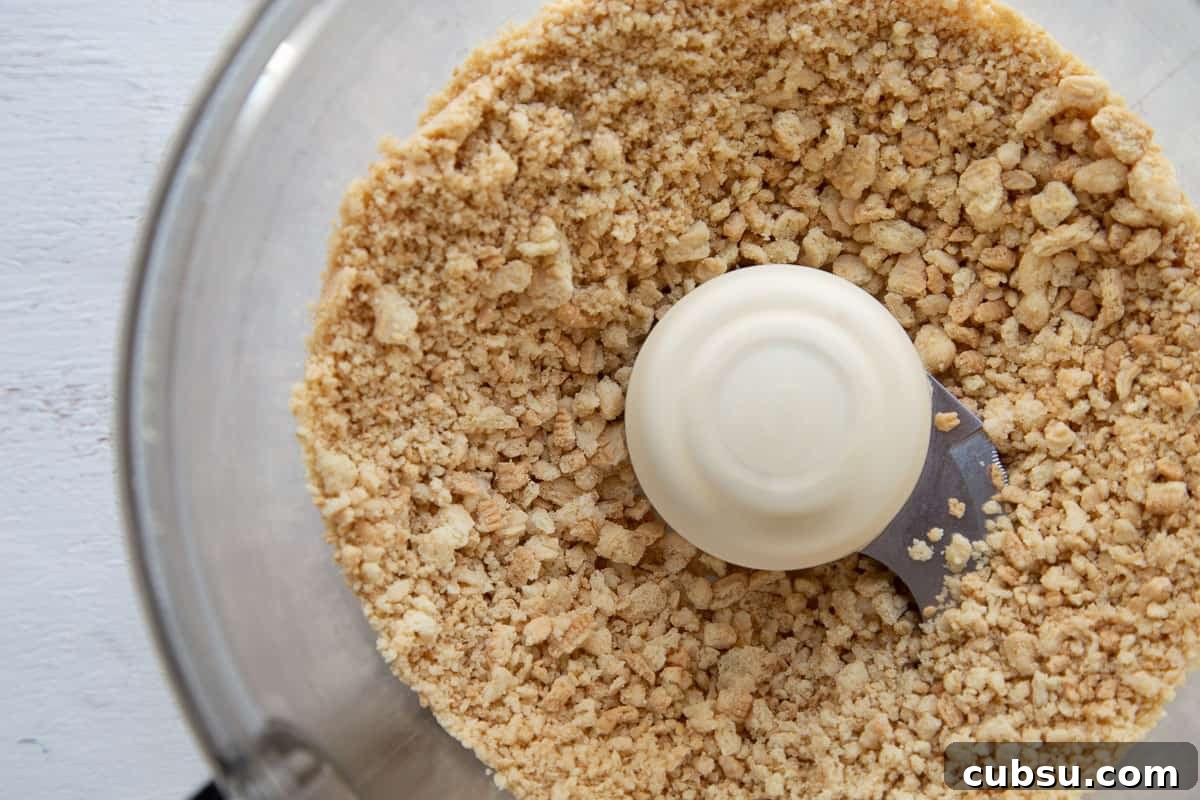 golden oreo crumbs in a food processor.
