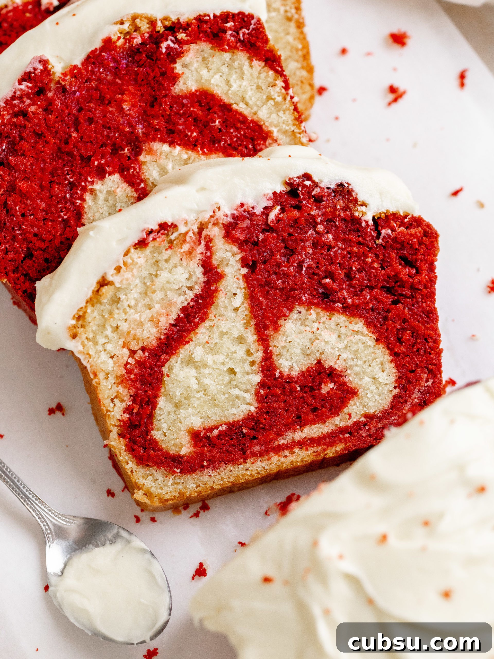 Moist Red Velvet Loaf Cake Recipe with Cream Cheese Glaze 8 Loaf on plate