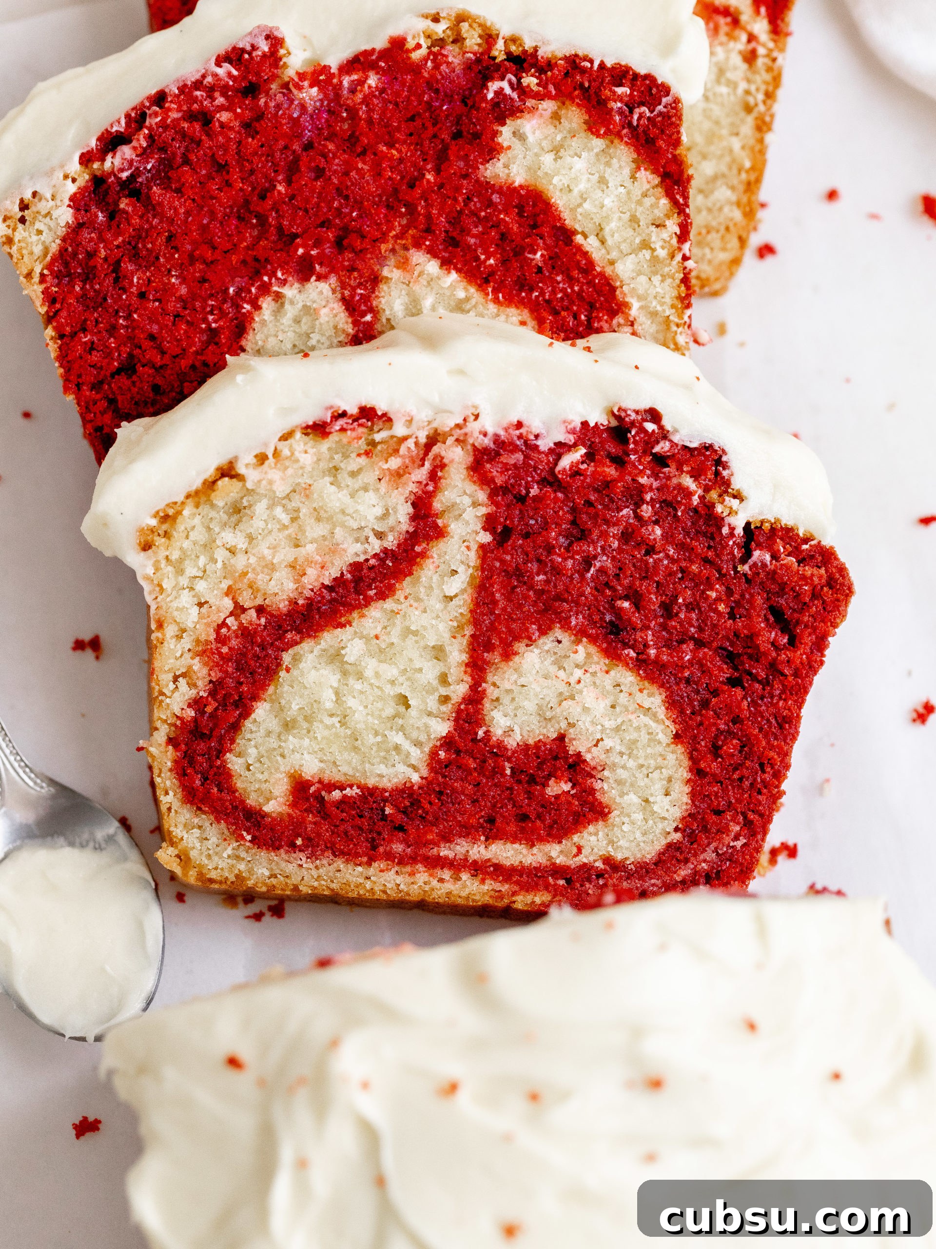 Moist Red Velvet Loaf Cake Recipe with Cream Cheese Glaze 9 Loaf slice with frosting