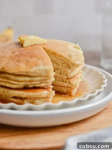 A portion of the bisquick banana pancake stack is missing.