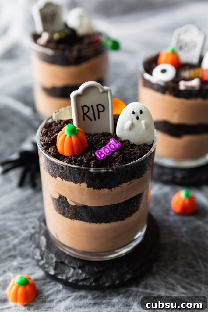 Spooky Halloween Dirt Cups Recipe for Kids and Parties 5 chocolate pudding cups with Halloween candy