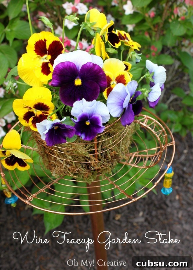 Goodwill Trash To Treasure Teacup Garden Stake - a great repurposed or upcyle project and DIY garden decor! | OHMY-CREATIVE.COM
