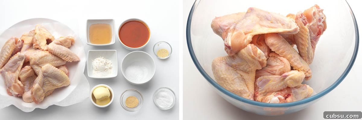 Crispy Buffalo Chicken Wings in the Air Fryer (Quick Recipe) 4 ingredients artfully arranged, raw wings in a bowl