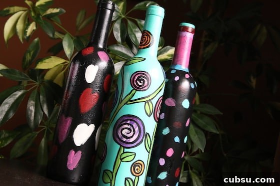 3 painted wine bottles