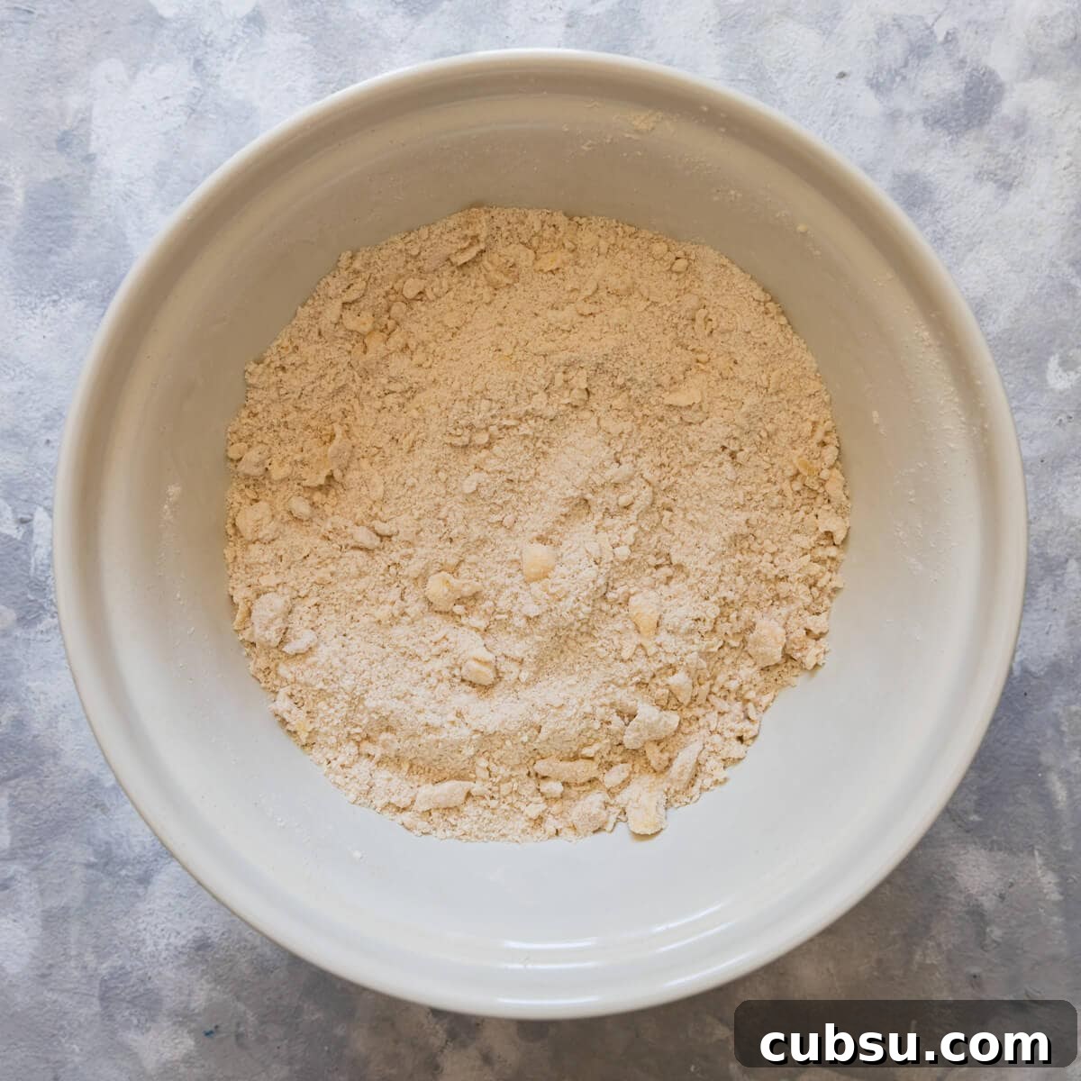 top down view of a crumble made with rubbing the butter into flour