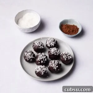 Chocolate Coconut Balls served on a plate.