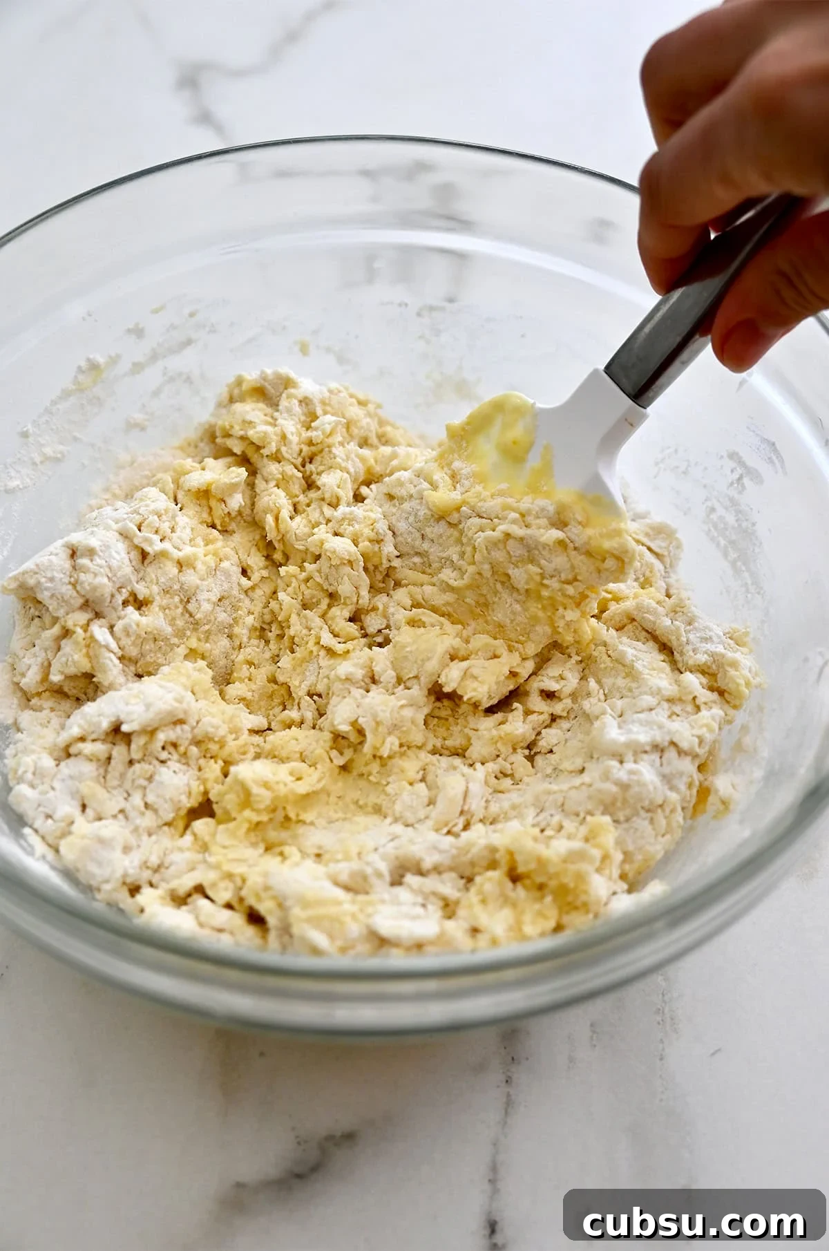 Crispy Belgian Waffles Recipe for Brunch and Weekend Mornings 6 Combining dry ingredients with the wet waffle ingredients.