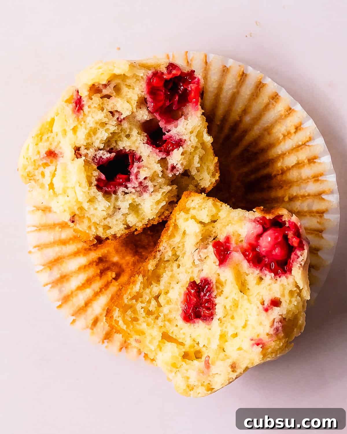 Moist Raspberry Muffins with Lemon Zest Recipe 7 These raspberry muffins are light, fluffy and incredibly moist bakery style muffins filled with fresh or frozen raspberries and a hint of lemon.