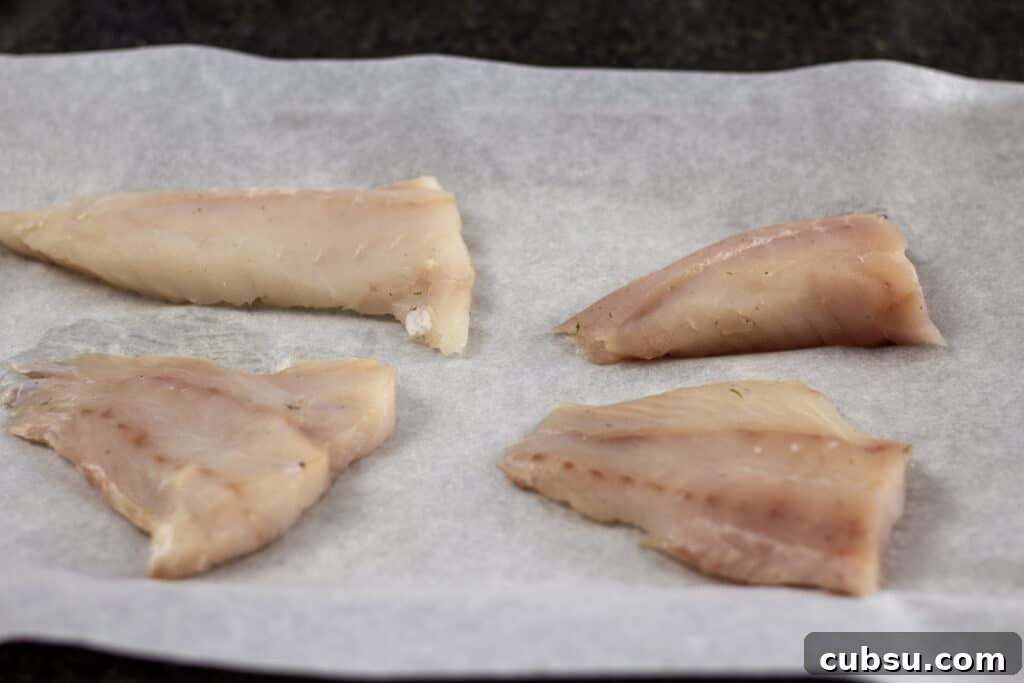 rockfish fillets on parchment paper