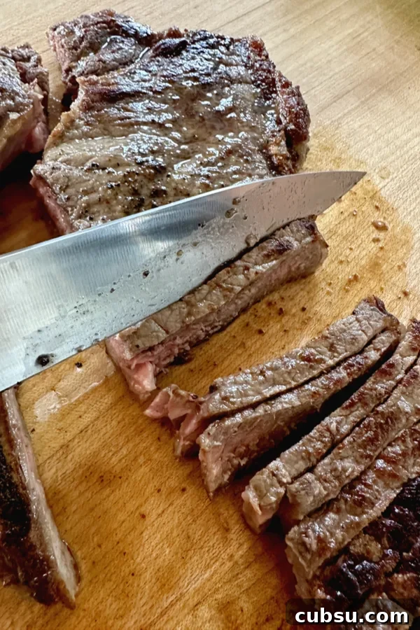 Perfectly Grilled Porterhouse Steak: Juicy Recipe & Tips 5 slicing steak against the grain