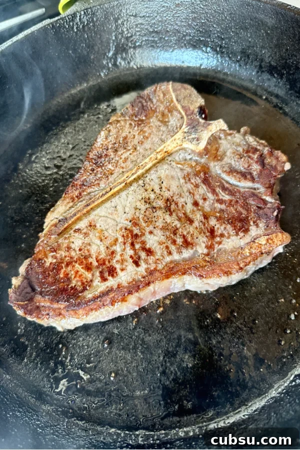 Perfectly Grilled Porterhouse Steak: Juicy Recipe & Tips 3 seared steak in cast iron skillet