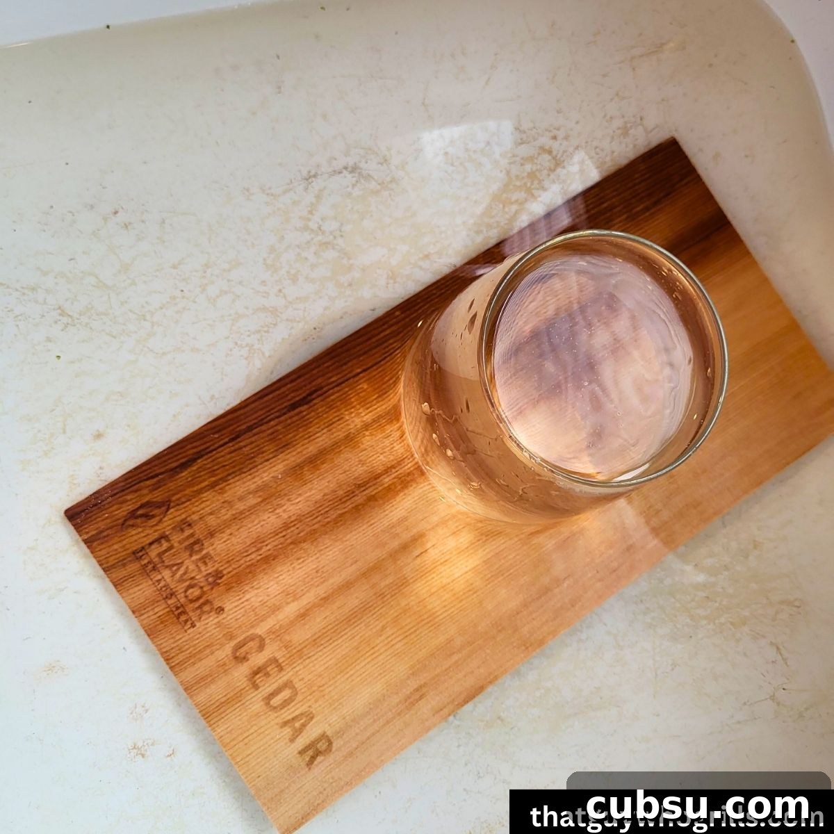 Fire and Flavor Cedar Planks Soaking in a sink of water