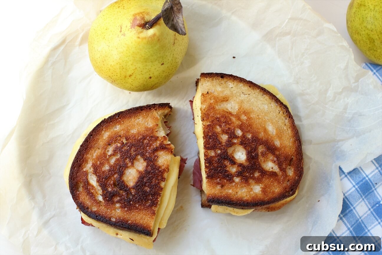 Pastrami and Pear Grilled Cheese Sandwich Recipe 3 one bite out of the pear and pastrami grilled cheese sandwich
