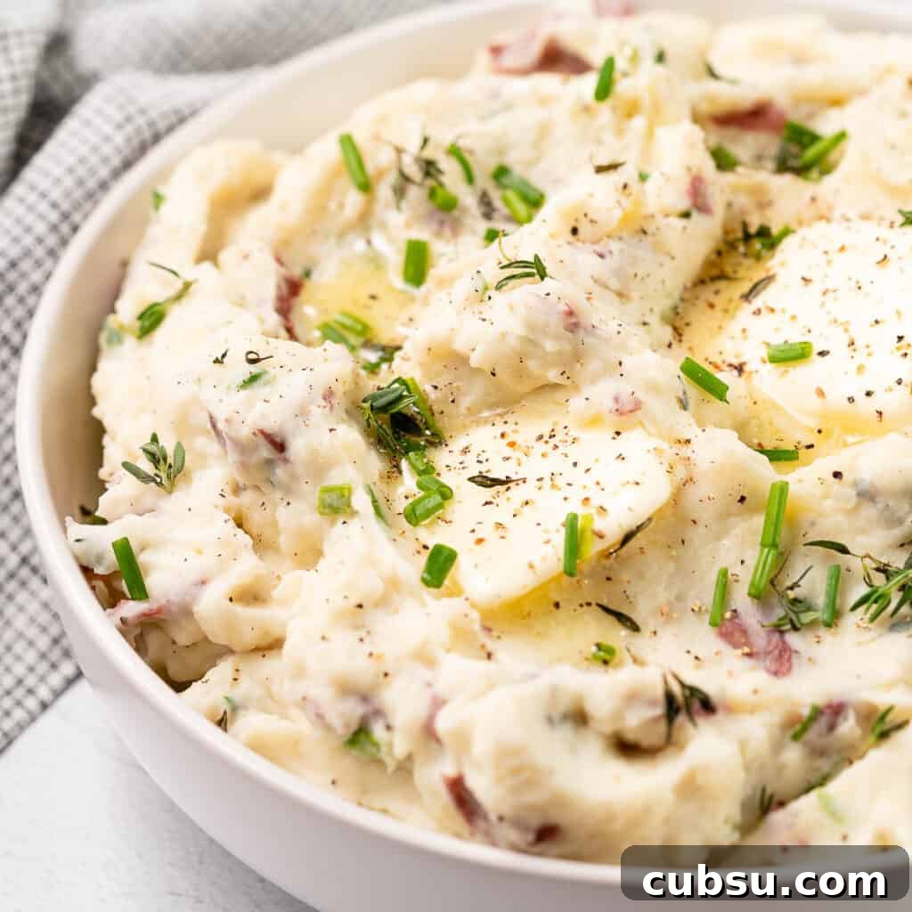 mashed potatoes in bowl with butter on top