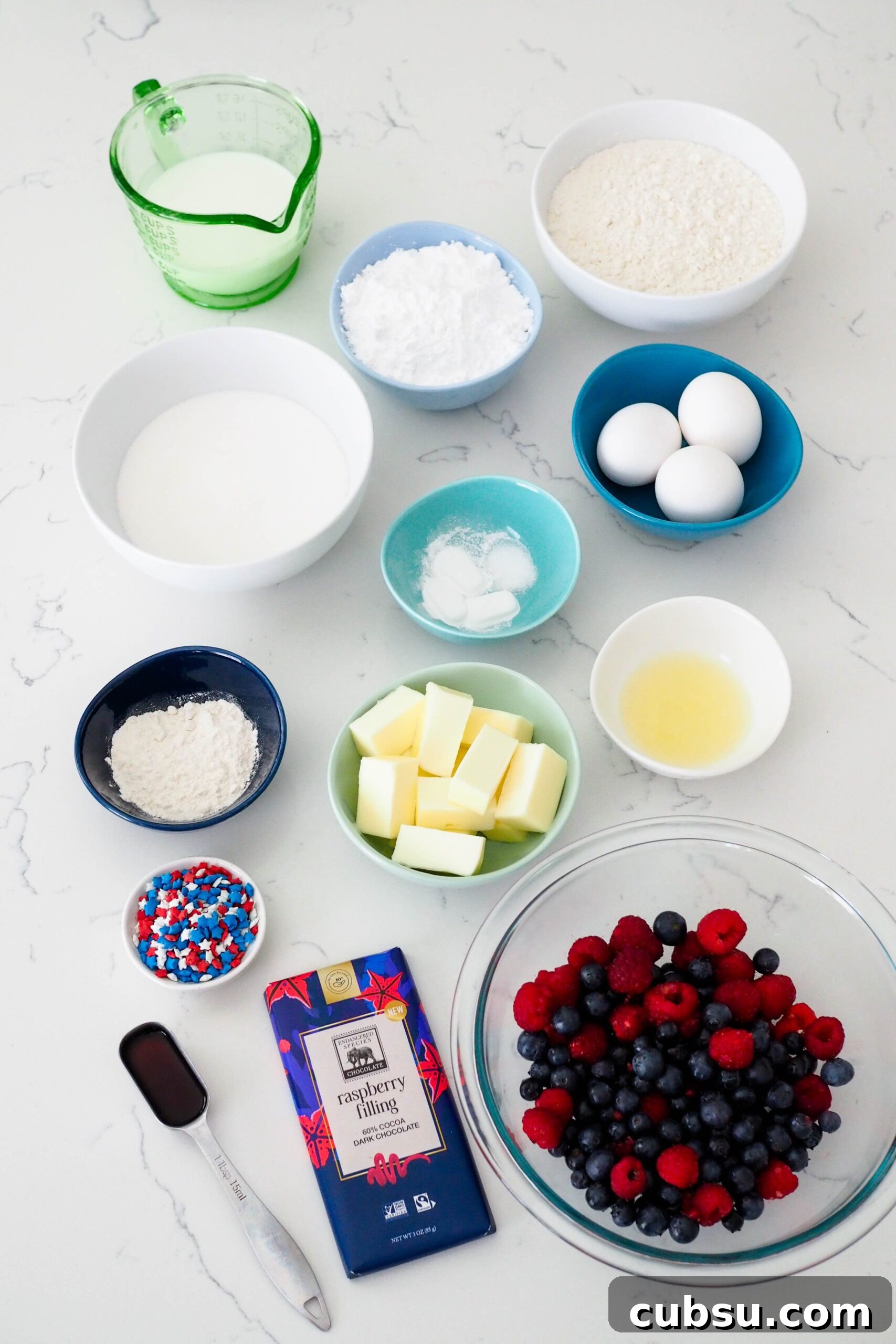 Ingredients for berry Bundt cake on a counter.