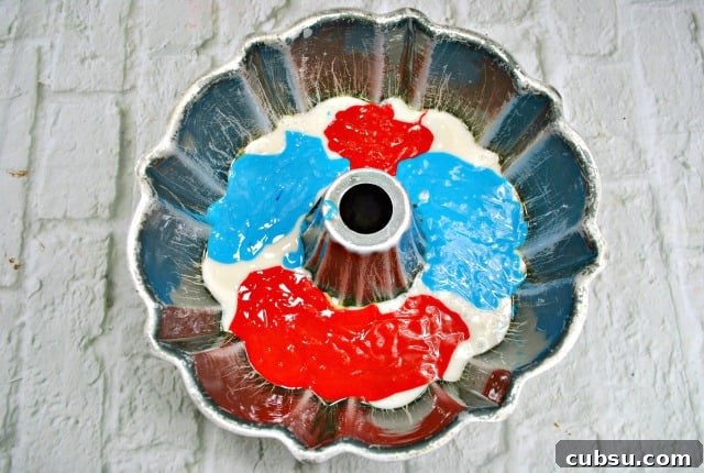 Patriotic Layer Cake: Red, White & Blue Dessert Recipe 5 making red white and blue cake in a bundt pan