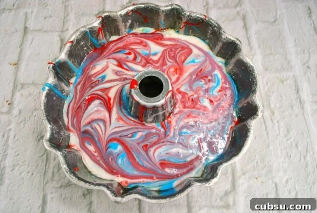 Patriotic Layer Cake: Red, White & Blue Dessert Recipe 6 patriotic bundt cake batter in pan