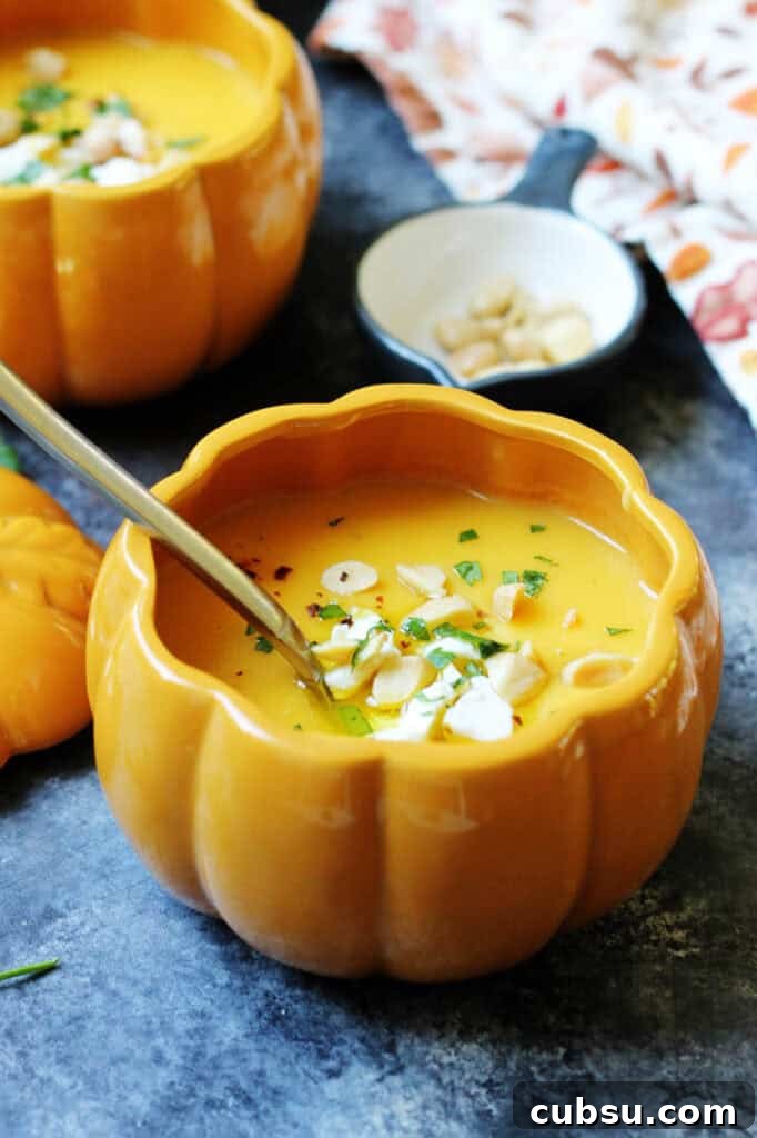 Roasted Butternut Squash Soup with Feta and Toasted Almonds 17 Closeup of a bowl of simple roasted butternut squash soup