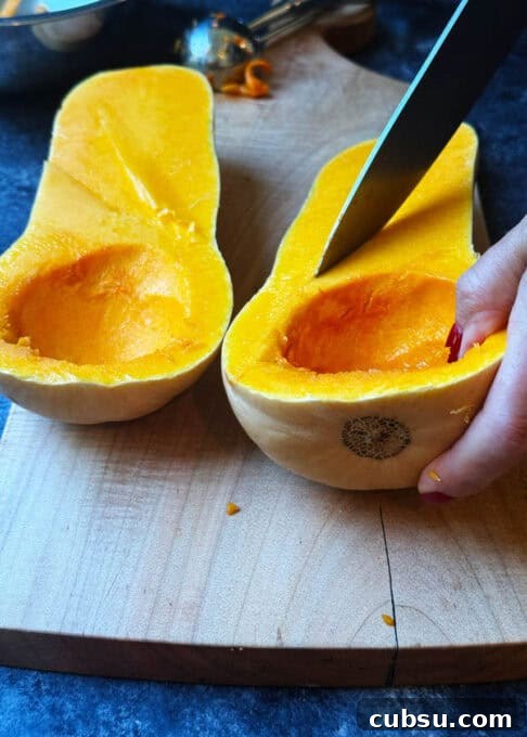 Scoring the flesh of the butternut