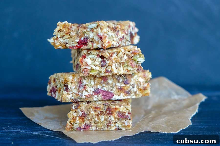 stacked pumpkin seed cranberry bars