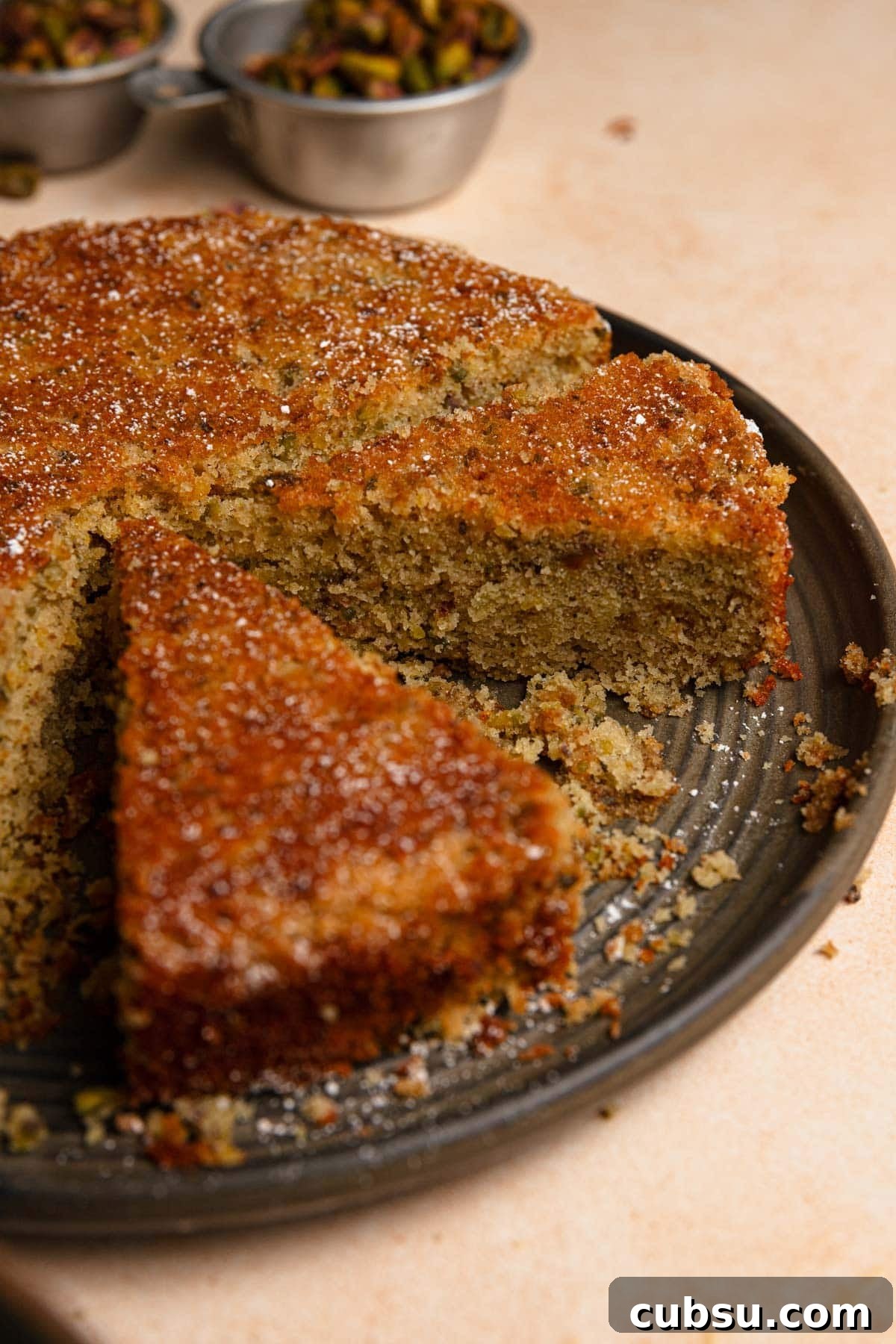 Pistachio torte in a plate.