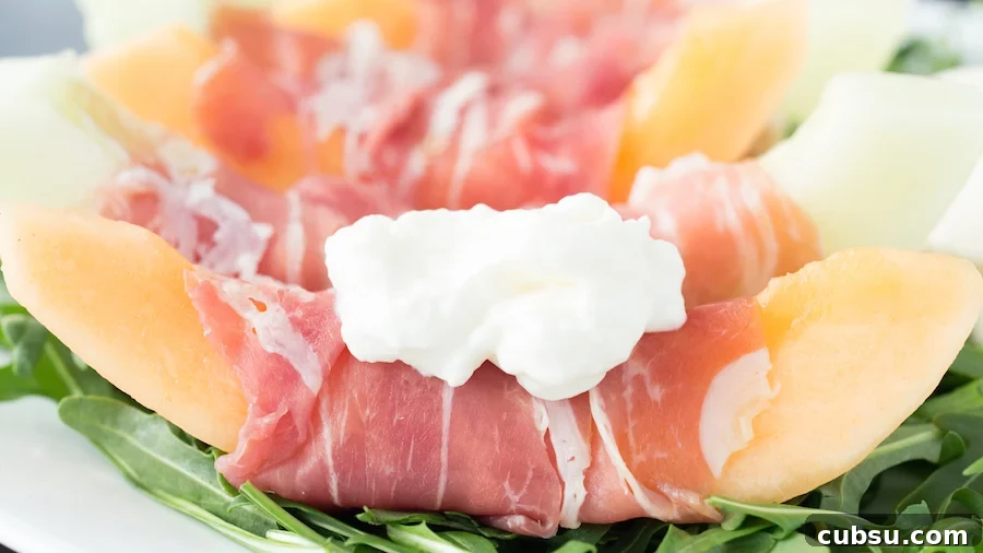Prosciutto, Melon & Burrata Salad with Balsamic Glaze 3 Cantaloupe & honeydew melon wrapped in prosciutto then topped with creamy burrata and served on a bed of arugula.
